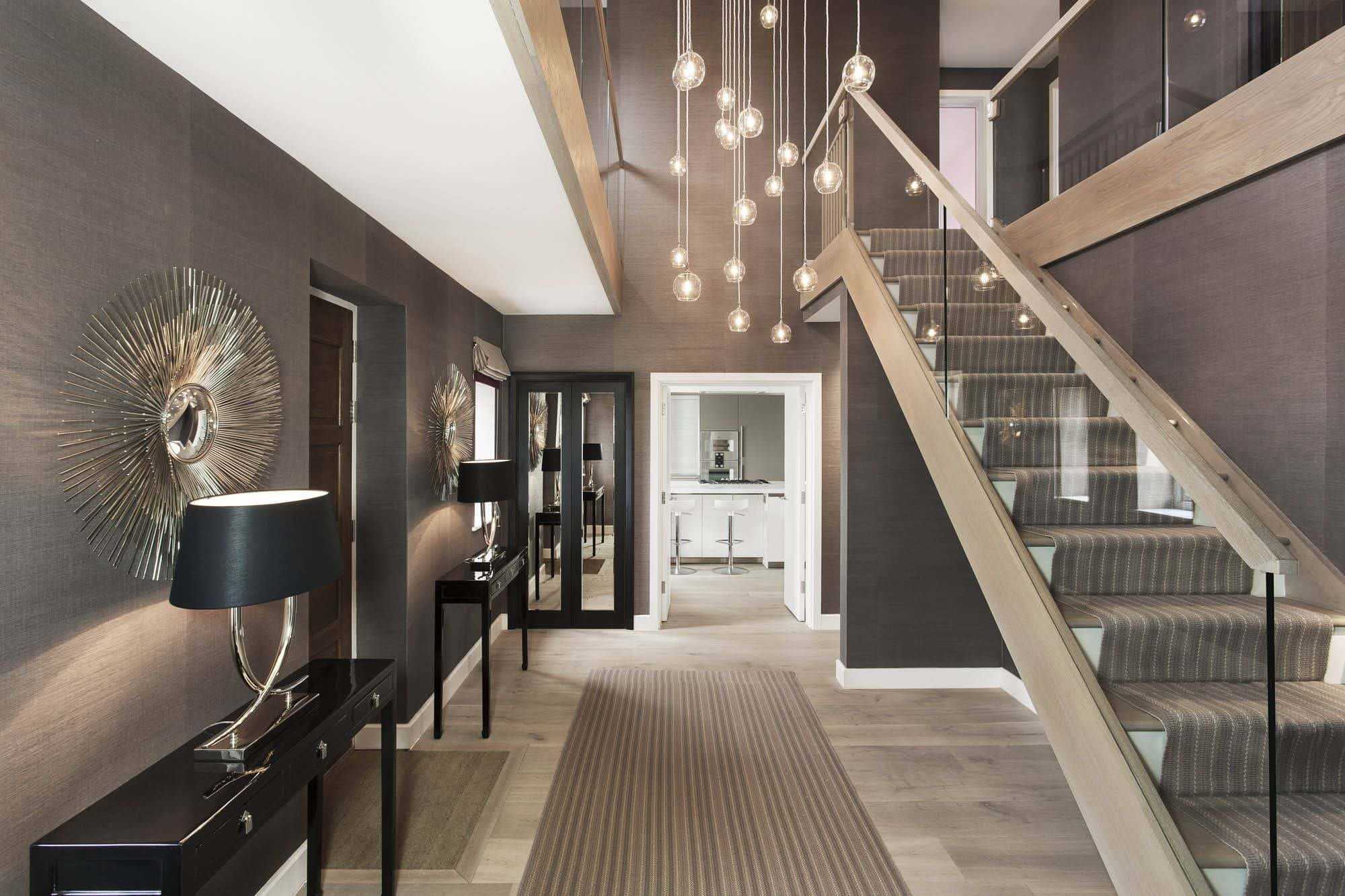 Прихожая с лестницей на второй этаж в частном доме фото коридора Самые инновационные дизайнерские решения по оформлению лестниц в 2019 году Популярная цветовая гамма