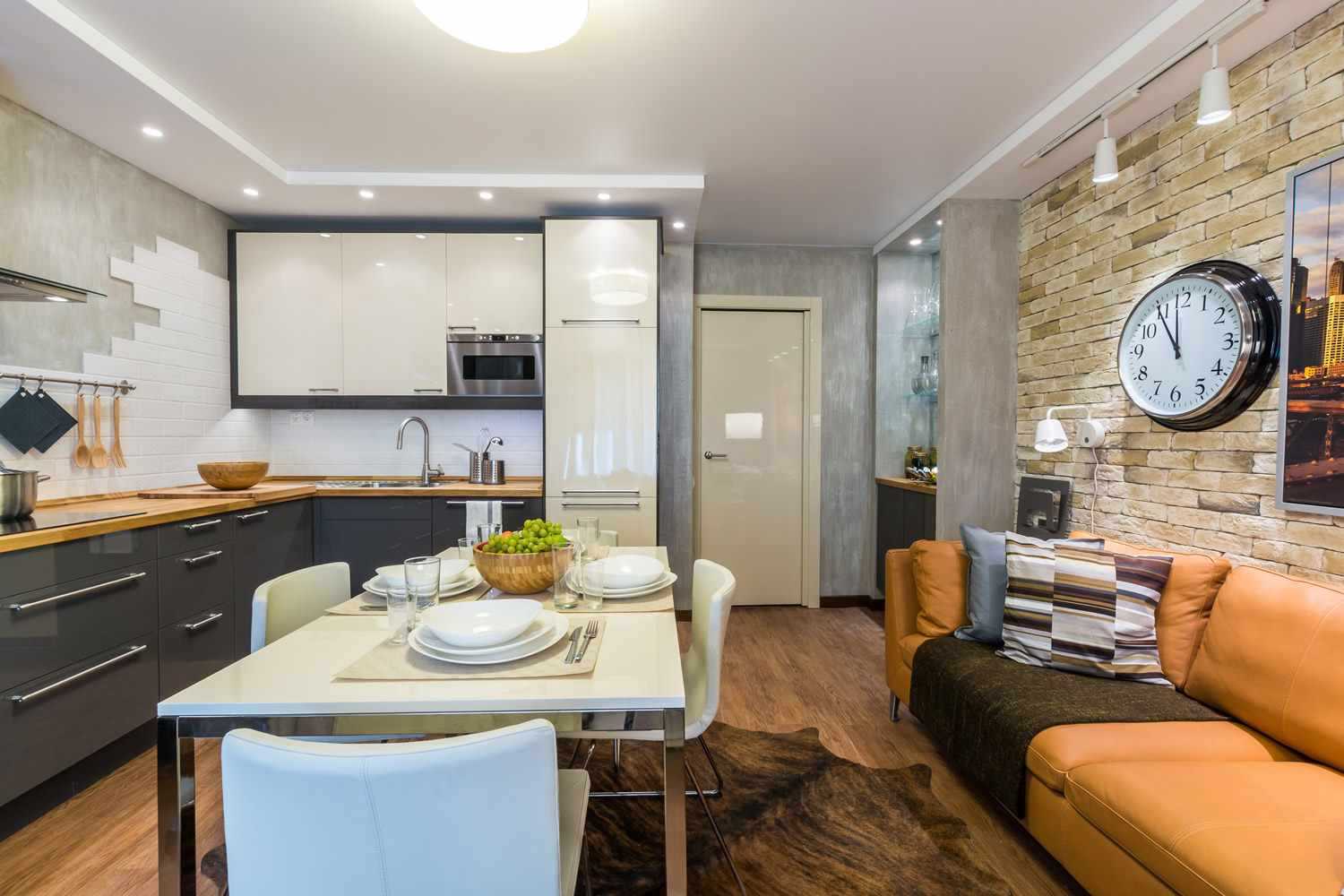 Хорошей возможностью для небольших квартир является объединение кухни с гостиной Получается интересный эффект  убирая одну стену или часть стены, у вас возникает огромная кухня и просторная гостиная