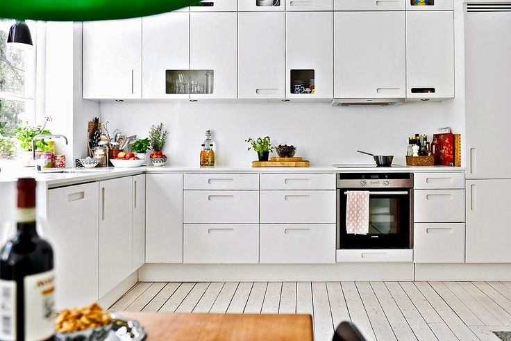 Кухня в скандинавском стиле: дизайн гарнитура, фартука, кухня-гостиная без верхних шкафов, малогабаритная угловая кухня
 - 33 фото